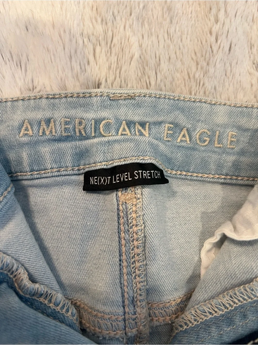 American Eagle Outfitters Nexxt Level Stretch Light Blue Distressed Denim Shorts
